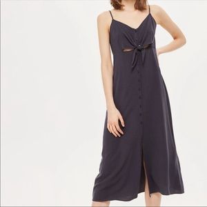 Navy blue button down dress with from tie accent